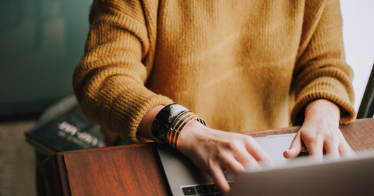 Freelancer managing clients and follow-ups on a laptop