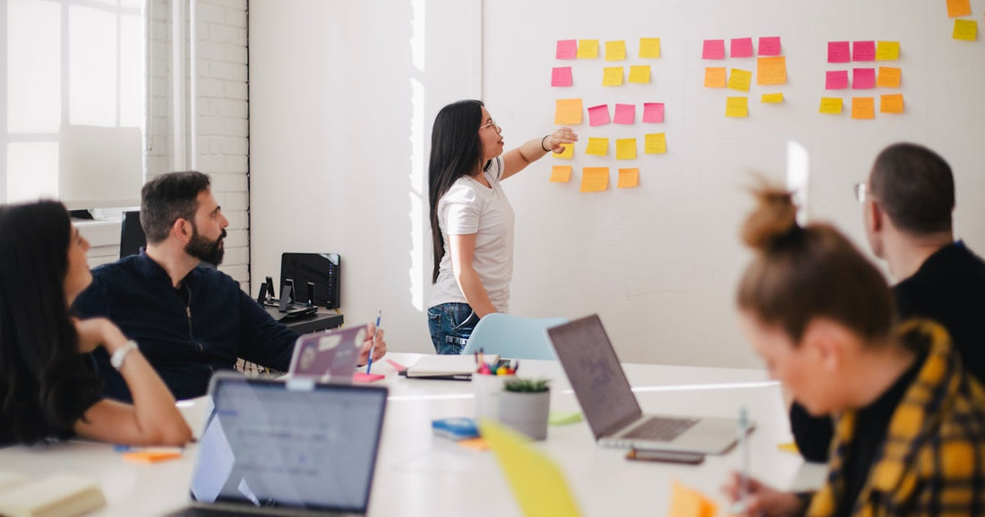 Consultant meeting a client across a table - consulting runs on memory, not pipelines